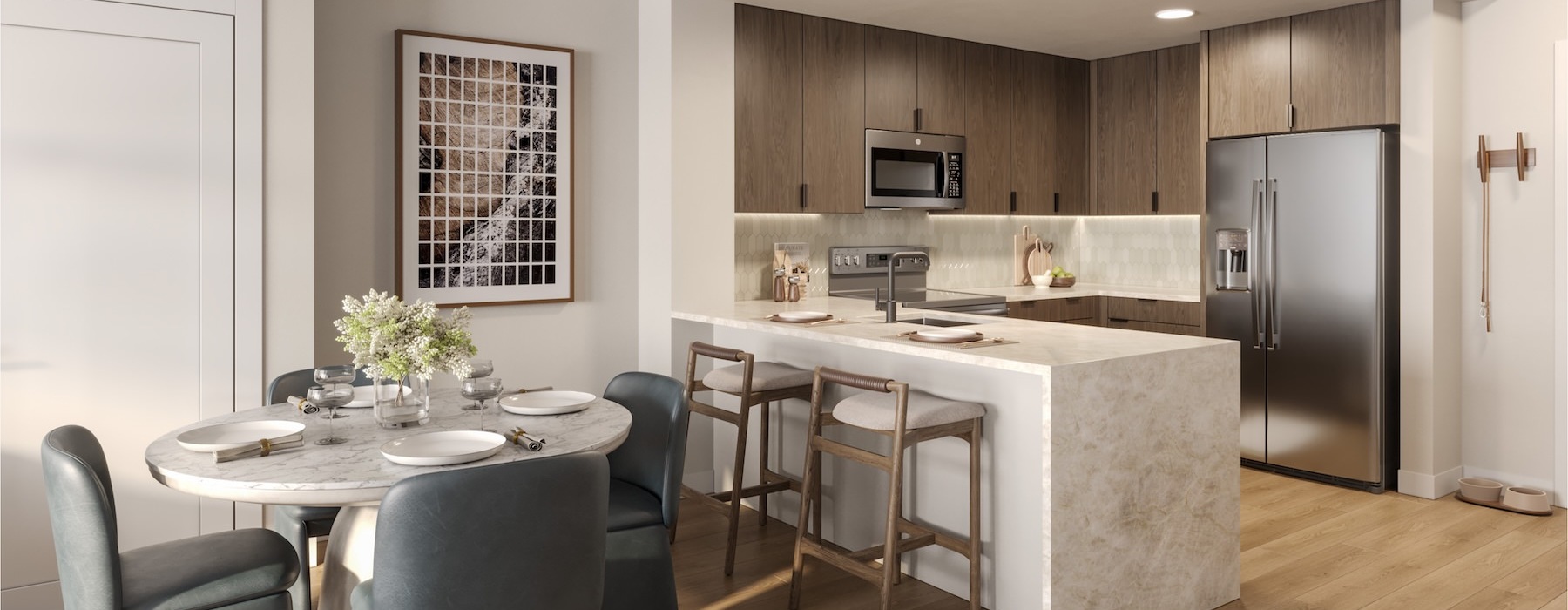 a kitchen with a dining table and chairs